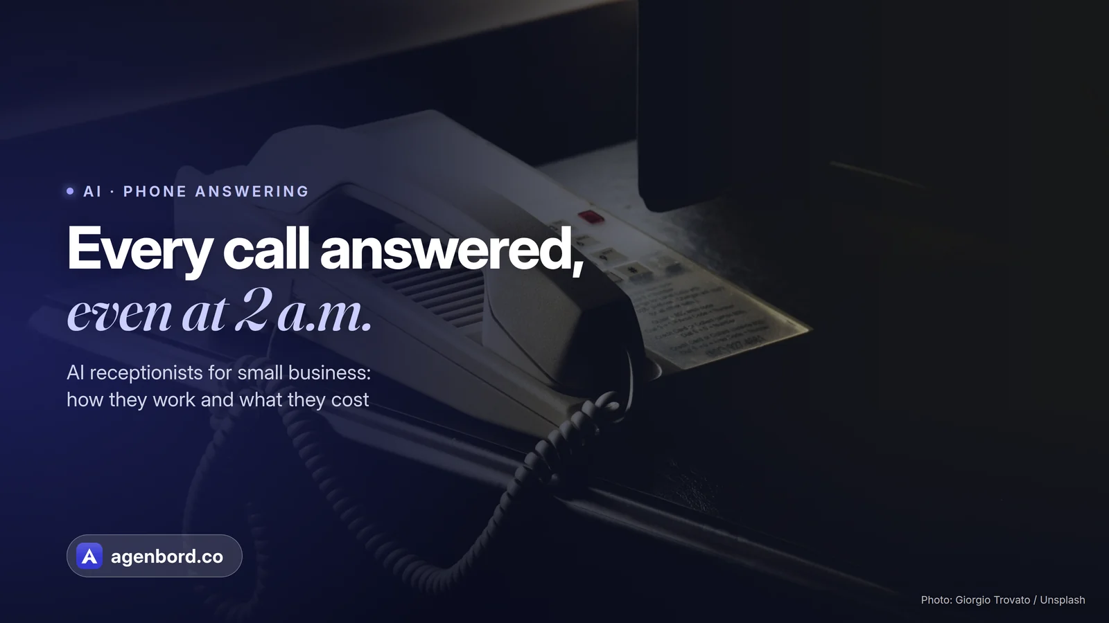 A desk phone on a dark office desk. Headline: Every call answered, even at 2 a.m.